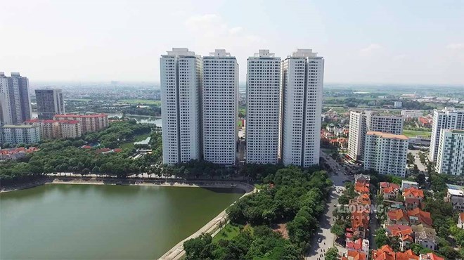 Khu đất dịch vụ tổng hợp và nhà ở tại KĐT Linh Đàm đã bị điều chỉnh quy hoạch để xây dựng 12 tòa nhà chung cư vượt tầng cao, khiến quá tải về dân số. Ảnh: Nguyễn Tùng.